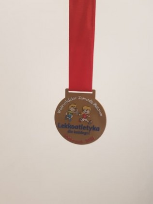 Halowe zawody skok w dal - medal